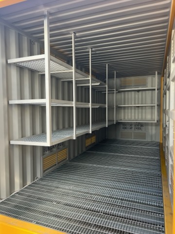 Dangerous goods container with internal shelving and bunded floor
